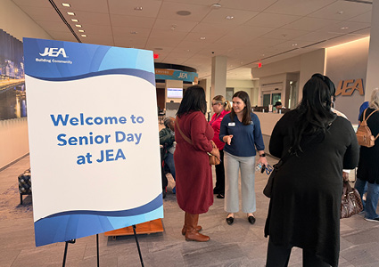 people gathered at a JEA Senior Day event hosted at their Downtown Jacksonville headquarters