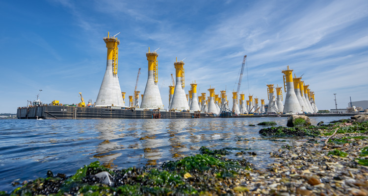 Gravity-Based Structures (GBS) serving as marine foundations for the Fécamp Offshore Wind Farm in Normandy, France