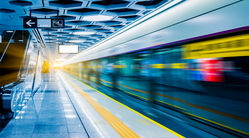 Blurred view of train leaving platform in city of China.